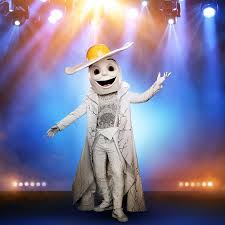 The flamingo wears a sparkly, pink pantsuit with pink feathers around the legs and arms, and pink feathers sticking out the back of her outfit. Masked Singer S New Costumes Even Crazier Reality Blurred