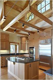 With a ceiling light from ikea, you can light a room with style. Track Lighting On Beams Track Lighting Kitchen Attic Lighting Attic Remodel