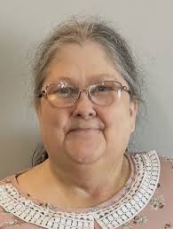 Donna Radcliff Neumann, age 70, passed away peacefully in her home in  Edwardsville, surrounded by the comfort and familiarity she cherished so  deeply. She grew up in Pana, IL, and graduated with