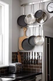 Short On Space Stylish Ways To Store Pots Pans Kitchen Storage Solutions Kitchen Inspirations Small Kitchen Solutions