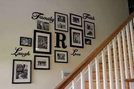 50 Stunning Photo Wall Gallery Ideas Decoratoo Photo Wall Gallery Staircase Wall Decor Stairway Decorating