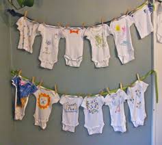 Baby Shower Idea Guests Use Fabric Markers To Customize A Onesie For The Baby Baby Shower Onesie Baby Projects Baby Shower