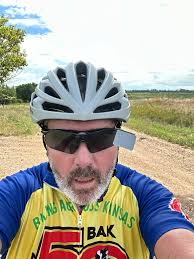 I too laugh in the face of danger… but I don't ride behind gravel trucks.