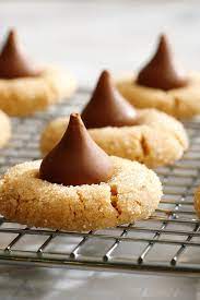 Peanut Butter Blossoms Recipe Recipe In 2021 Peanut Butter Blossoms Recipe Peanut Butter Blossom Cookies Peanut Butter Cookie Recipe