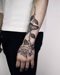 It looks good as a single tattoo, but most butterfly tattoos have trail ink or other images, such as stars or flowers. Rose And Butterfly Tattoo On Hand By Yejitattoo Rose And Butterfly Tattoo Butterfly Hand Tattoo Hand Tattoos