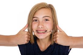 Is Orthodontic Headgear Effective for Teeth Alignment? - Houston Uptown  Dentists