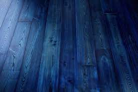 These Are The Wood Floor Color Trends To Know Right Now Wood Floor Colors Floor Colors Blue Wood