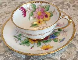 There are three cup styles that are very similar: English Bone China Small Cup And Saucer Floral Sweet Tuscan Vintage Demitasse Teacup Bouquet Pattern Made In England Home Living Tea Cups Sets Commentfer Fr