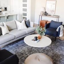 These designs are typically the same height as your seat cushions and should be no more than 1 to 2 inches lower than the seat of your couch. Origami Coffee Table