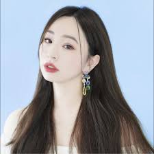 Miss Natasha Lam added a new photo — at...