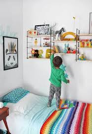 The kids' room decorating experts at hgtv.com share photos of a young boy's room with an artistic, colorful and modern english decorating theme. Colourful Boys Room Inspiration Kids Room Ideas Kids Room Decor Colorful Kids Room Kids Room Shelves Kids Room Inspiration