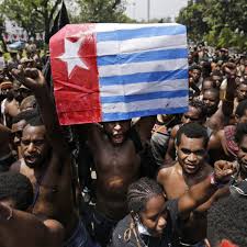 Papua new guinea, a country located in the eastern half of the island of new guinea. Global Protests Throw Spotlight On Alleged Police Abuses In West Papua Global Development The Guardian