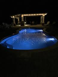 The Imagine Pools Fantasy Fiberglass Swimming Pool A Beautiful Site At Night As Well As The Day No Fiberglass Swimming Pools Swimming Pools Pool At Night