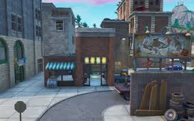 It's on a hilltop overlooking tilted towers in the southeast of the area. Tilted Towers Fortnite Wiki