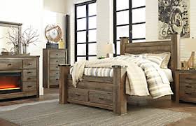 3.8 out of 5 stars 3. Trinell Queen Poster Bed With 2 Storage Drawers Ashley Furniture Homestore