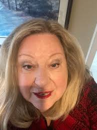 Neighbours give cake to 67 year old woman