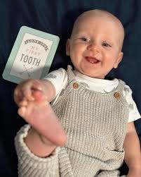 6 months as of 8/15/24 🥹💙🧸 -Two bottom teeth and one coming through