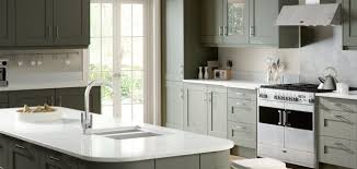 Here, yellow and black barstools add a splash of color to an otherwise neutral kitchen. Green Olive And Sage Kitchens Price Kitchens