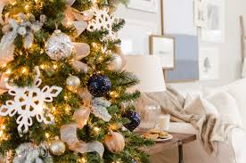 Another thing we love about these unique blue christmas decor ideas is that just because you're adding icy accents into the mix doesn't mean you can't still pair them with traditional colors too. Navy And Gold Christmas Tree Nick Alicia