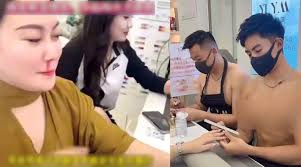 Tiệm làm móng để nam nhân viên cởi trần phục vụ khách hàng