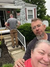 Volunteers help others in community