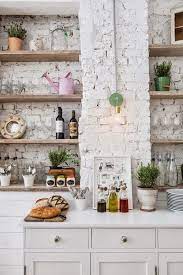 Then, touches of white color on several spots bring openness for the area. Exposed Brick Wall Brick Wall Kitchen Brick Interior White Wash Brick