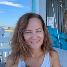 When to spay a Doberman after her first heat cycle?