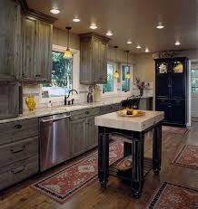 Kitchens and bathrooms are focal points in any home, and nothing detracts from the unique beauty of a log home like having standard cabinets from a local home center. Rustic Kitchen Cabinet Doors Drawers Crown Molding Walzcraft