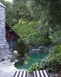 Domino On Instagram One Word To Describe Leannefordinteriors S Backyard Lagoon Go We Re Choosing Dreamy For Obvious R Backyard Backyard Paradise Outdoor