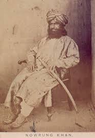The Khan of Lalpura - Mohmand Khan and armed escort. 1878 Mohmand Khan was considered a British Ally and was closely associated with the Political Agent. Photographer - John Burke.