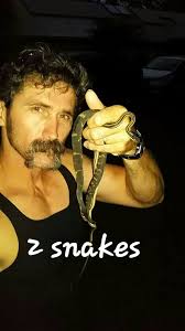 Can you help identify the snakes in the fishing net?