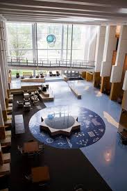 There Are Signs And Symbols Of Science From A Cross Section Of Earth S Rock Layers As On The Wall To The Hydrogen Atom Sculpture Susp Atrium Four Square Tours