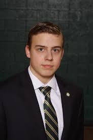 In a double-dual meet in the Gemini Center, St. Edward varsity swimming  goes 1-1