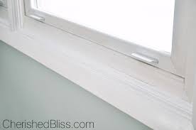 A rule of thumb for modern homes, even those housed in older buildings, is that if you want to keep things clean, use white paint for all of your molding. Tips On How To Paint Wood Trim Cherished Bliss