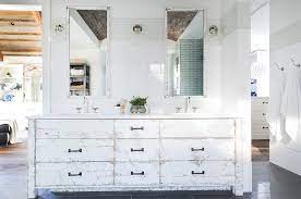 Bathroom cabinets can be built around corners to take full advantage of a space and its layout. Whitewashed Vanity Design Ideas
