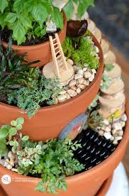 The fairy gardens have become now and integral part of the home decor especially that of the gardens.they are also a fun embellishment for the kid's room too so do make add a sign to the jar to let you remember the day of your beach visit, and it's completely done. 25 Diy Fairy Garden Ideas How To Make A Miniature Fairy Garden