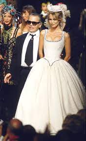 Karl Lagerfeld S Muses See Every Model Who S Worn The Iconic Chanel Wedding Dress On The Runway Chanel Wedding Dress Fashion Wedding Dress Couture