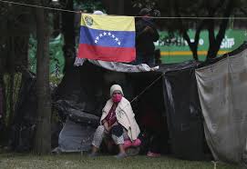 Venezuelan migrants are as eligible as colombian citizens for the vaccine due to their temporary protected status, announced this february by president ivan duque. Stranded Venezuelans Build Camp In Colombia Amid Pandemic