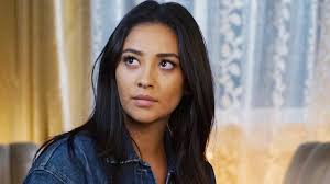 Shay Mitchell looking SCARY in Wonderland mag photoshoot with blonde hair  and blue contact lenses