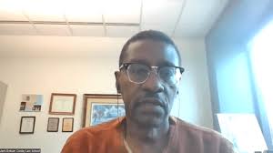 Law professor weighs Tucker's options in contract battle