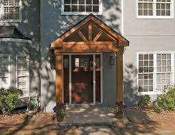 Timber Frame Portico With Gable Roof Designed And Built By Georgia Front Porch Gable Roof Design Front Porch Design Portico