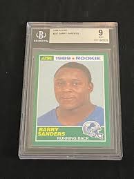 The card stands out among the three because it is the only one to feature sanders in a posed image. Lot Beckett 9 Mint 1989 Score Barry Sanders Rookie 257 Football Card