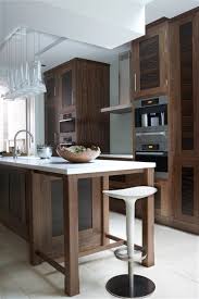 Exotic wood picks it up and will look fantastic against the floor tiles. Macassar Ebony Kitchens Contemporary Kitchen West Midlands By Hutchinson Furniture And Interiors Houzz