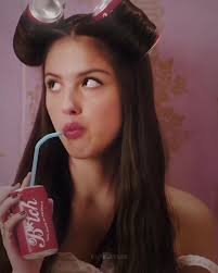 Olivia Rodrigo Spotify Canvas with Coca Cola Bottles in Her Hair