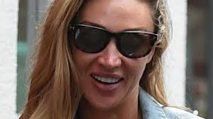 Ryan Giggs' pregnant girlfriend Zara Charles shows off her bump while  leaving a beauty salon in Cheshire as she prepares to welcome her first  child with the footballer