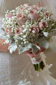 Romantic Wedding Bouquet Featuring Dusty Pink Roses White Gypsophila Dusty Miller Flower Bouquet Wedding Wedding Bouquets Pink White Wedding Bouquets