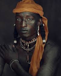 Among the Wodaabe, both men and women carry the marks of their identity