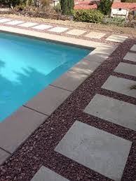 When it comes to convenience, appearance and durability, pool deck pavers are ideal. Rock And Paver Hard Scape Around Pool Hardscape Pool Pavers Pool Hardscape Ideas