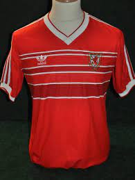 A collection of shirts one of the art of the wales shirt exhibition highlights, a pair of home and away lotto shirts, both. Wales Home Fussball Trikots 1984 1987