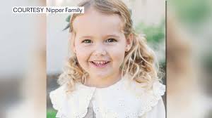 Artist painting helmet for South Tampa girl recovering from viral  meningitis, severe encephalitis